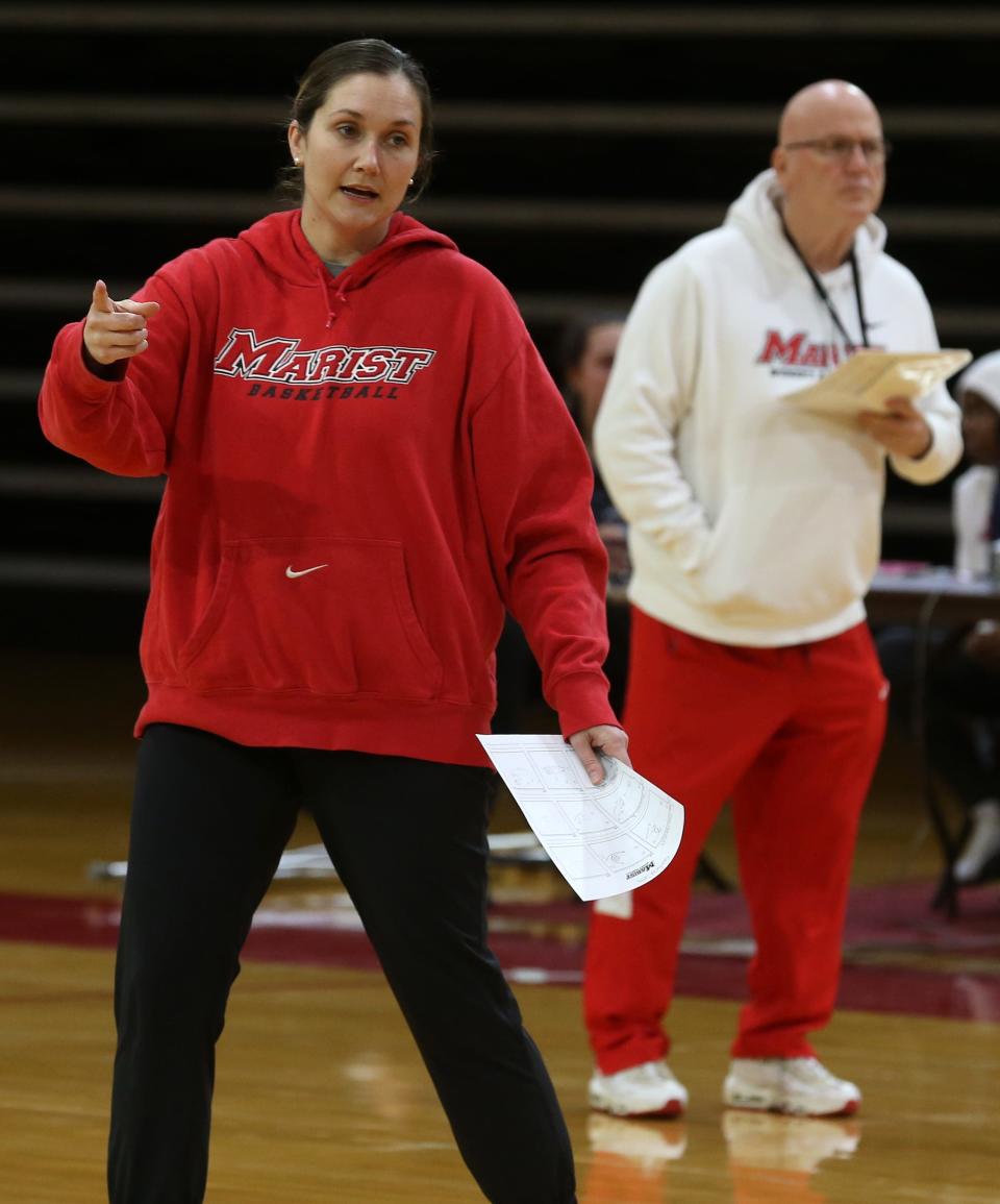 Marist College women's assistant basketball coach Erin Doughty runs a practice under the watchful eye of head coach Brian Giorgis  at the McCann Arena at Marist College in Poughkeepsie Feb. 21, 2023. Giorgis will be retiring at the end of this season after many years at Our Lady of Lourdes and Marist College.