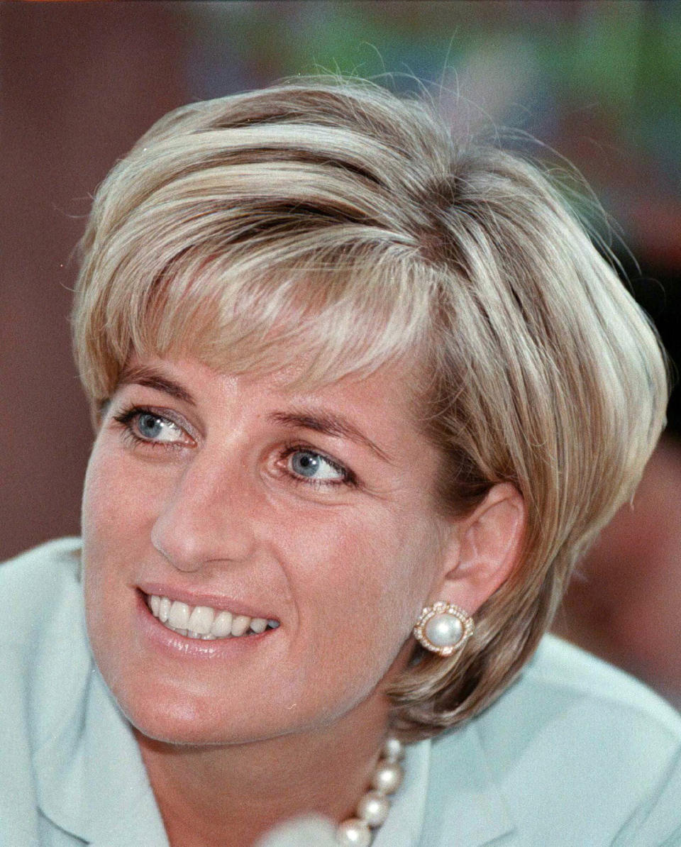 FILE - Diana, the Princess of Wales during her visit to Leicester, England on May 27, 1997 to formally open The Richard Attenborough Centre for Disability and Arts. Above all, there was shock. That’s the word people use over and over again when they remember Princess Diana’s death in a Paris car crash 25 years ago this week. The woman the world watched grow from a shy teenage nursery school teacher into a glamorous celebrity who comforted AIDS patients and campaigned for landmine removal couldn’t be dead at the age of 36, could she? (AP Photo/John Stillwell, Pool File)