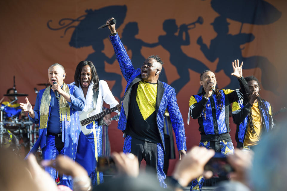 Ralph Johnson, from left, Verdine White, B. David Whitworth, and Philip Bailey of Earth, Wind & Fire perform at the New Orleans Jazz and Heritage Festival on Thursday, April 25, 2019, in New Orleans. (Photo by Amy Harris/Invision/AP)