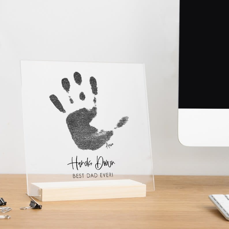 <p><a href="https://go.redirectingat.com?id=74968X1596630&url=https%3A%2F%2Fwww.etsy.com%2Flisting%2F1018485846%2Fhandprint-art-gift-on-acrylic-with-wood&sref=https%3A%2F%2Fwww.thepioneerwoman.com%2Fholidays-celebrations%2Fgifts%2Fg36299462%2Ffathers-day-gifts-from-kids%2F" rel="nofollow noopener" target="_blank" data-ylk="slk:Shop Now;elm:context_link;itc:0;sec:content-canvas" class="link ">Shop Now</a></p><p>Acrylic Desk Art</p><p>etsy.com</p><p>$30.40</p><span class="copyright">circleandsquaredecor</span>