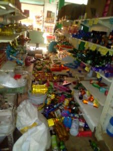 Fallen merchandise is seen on the floor of a shop after an earthquake in Oaxaca, Mexico February 16, 2018, in this image taken from social media. HUMBERTO RAMOS/via REUTERS