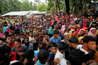 <p>Rohingya refugees gather to collect relief at the Balukhali Makeshift Refugee Camp as they are affected by Cyclone Mora in Coxís Bazar, Bangladesh, May 31, 2017. (Mohammad Ponir Hossain/Reuters) </p>