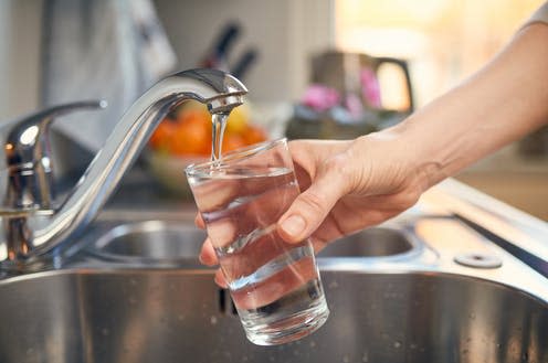 <span class="caption">Fluoride is a mineral that can occur naturally in water.</span> <span class="attribution"><a class="link " href="https://www.shutterstock.com/image-photo/pouring-fresh-tap-water-into-glass-1007226595" rel="nofollow noopener" target="_blank" data-ylk="slk:sonsart/ Shutterstock;elm:context_link;itc:0;sec:content-canvas">sonsart/ Shutterstock</a></span>