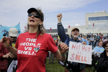 Activists protest the Polar Pioneer in Seattle, Washington, United States April 26, 2015. REUTERS/Jason Redmond