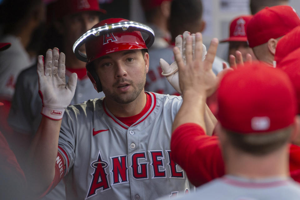 Los Angeles Angels' Nolan Schanuel is congratulated by his teammates after hitting a solo home run off Cleveland Guardians starting pitcher Tanner Bibee during the third inning of a baseball game in Cleveland Friday, May 3, 2024. (AP Photo/Phil Long)