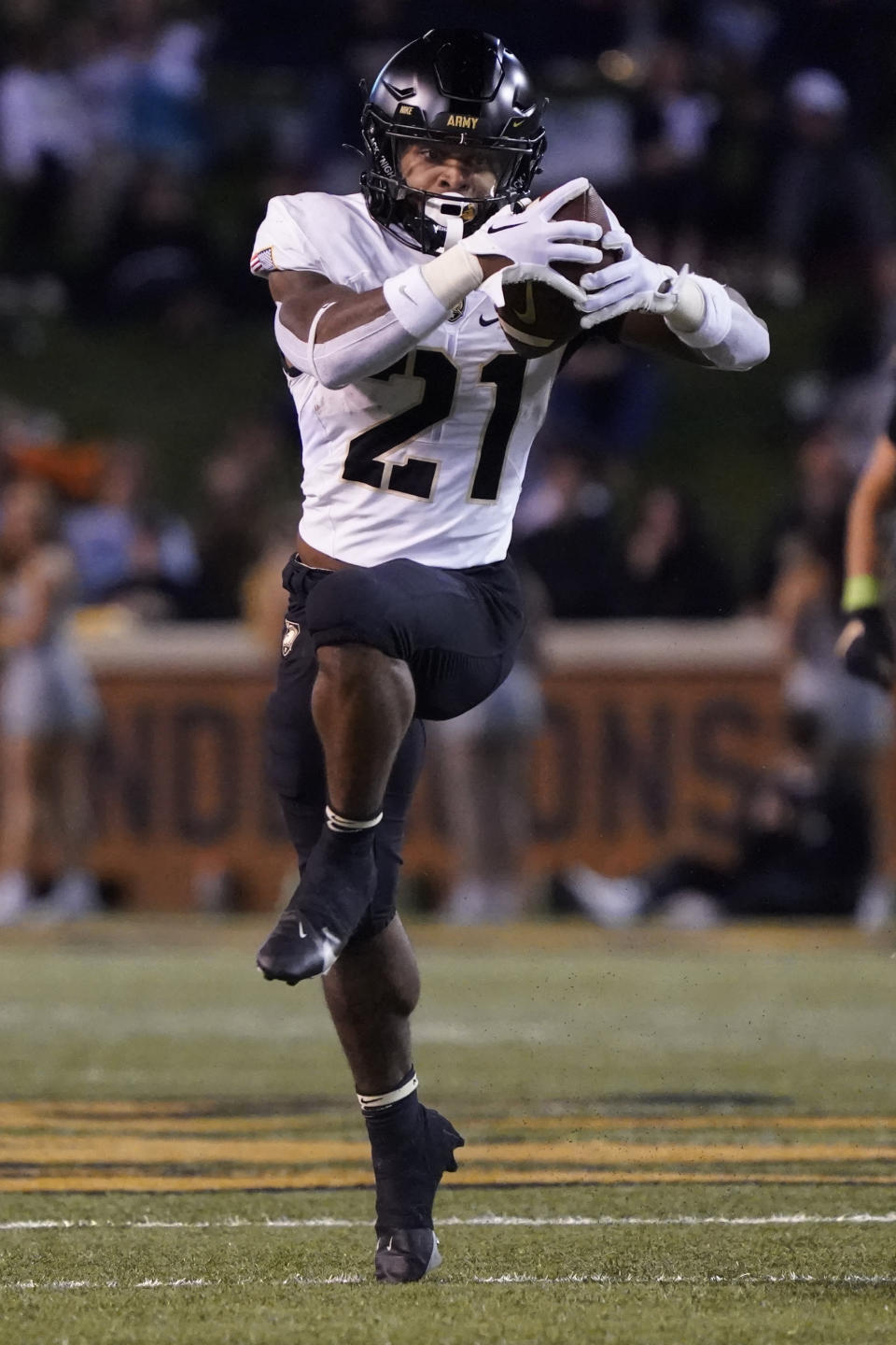 Army running back Tyrell Robinson (21) runs after aa catch against Wake Forest during the first half of an NCAA college football game in Winston-Salem, N.C., Saturday, Oct. 8, 2022. (AP Photo/Chuck Burton)