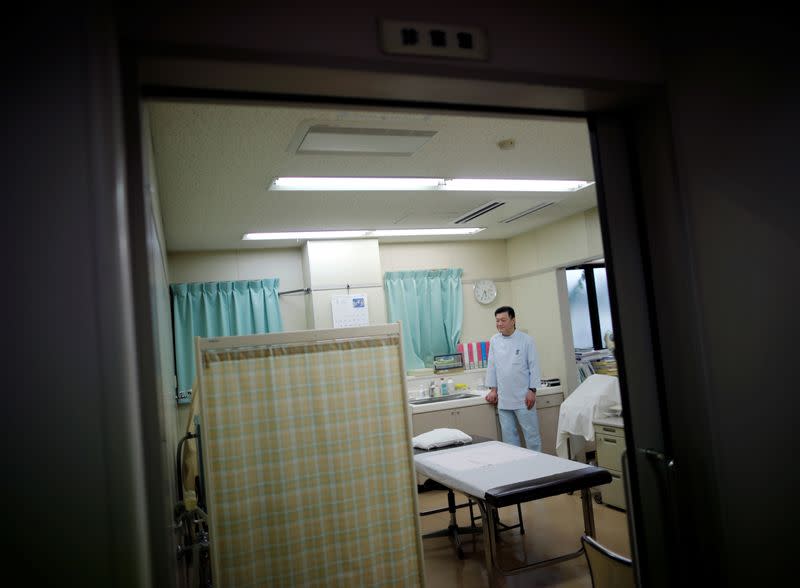 Toshihiko Yamazaki, a doctor who is also the director of the National Federation of Health Care Organizations is seen inside a treatment room at his urology clinic in Urawa, Japan