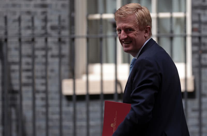 Britain's Secretary of State for Digital, Culture, Media and Sport Oliver Dowden walks outside Downing Street in London