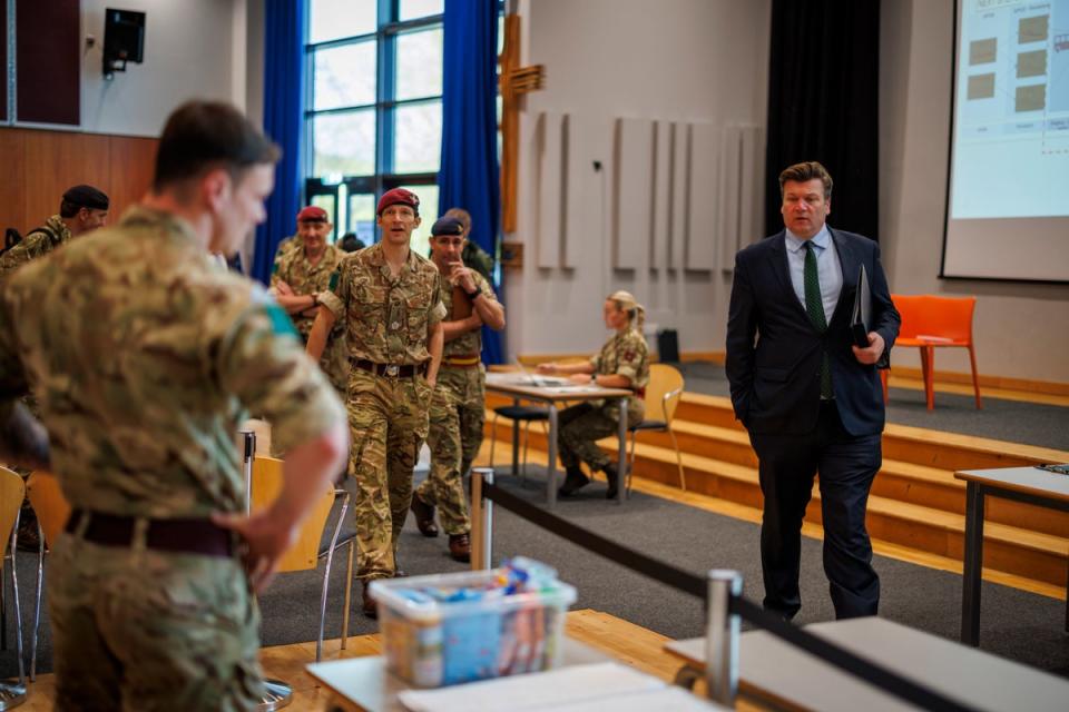 Defence minister James Heappey is shown the lecture hall that has been turned into a reception room (UK MoD Crown Copyright)
