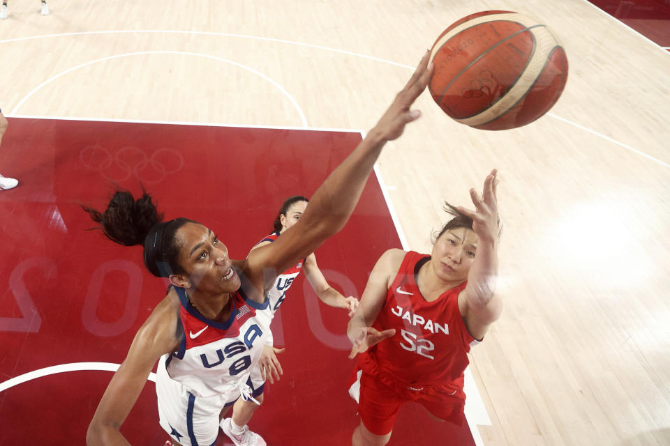 United States' A'Ja Wilson (9) blocks a shot by Japan's Yuki Miyazawa (52) during a women's basketball preliminary round game at the 2020 Summer Olympics, Friday, July 30, 2021, in Saitama, Japan. (Gregory Shamus/Pool Photo via AP)