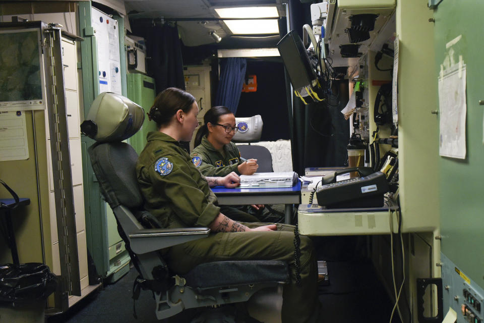 In this August 2023 photo provided by the U.S. Air Force, two missile launch officers, Lt. Sam McGlinchey, 28, front, and Lt. Joy Hawkins, 23, finish a 24-hour underground shift at a launch control center at Malmstrom Air Force Base. To Hawkins and McGlinchey, the news that the Air Force was testing their capsules for potential cancer-linked contaminants meant they’d need to be diligent about medical checkups. “For us early in our careers, it’s better to be caught so early," McGlinchey said. (U.S. Air Force via AP)
