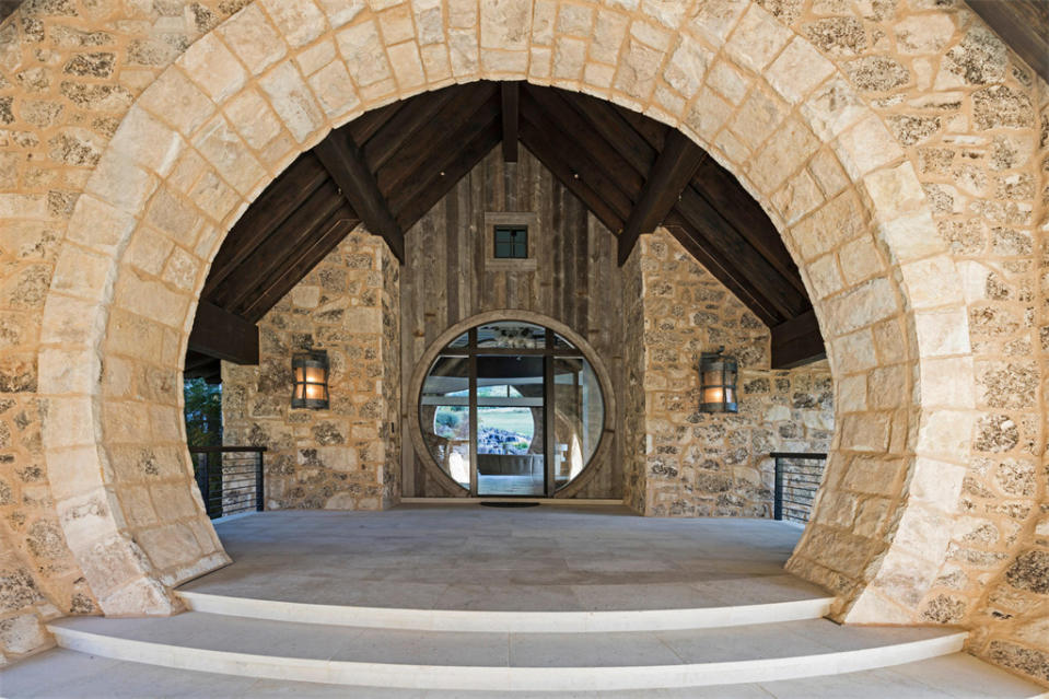 <p>The exterior is blanketed with beautiful stones quarried in Utah and matched with old barn wood planks and large beams to create a rustic mountain home. </p>