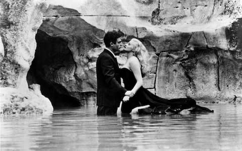 Anita Ekberg and Marcello Mastroianni in the Fellini classic La Dolce Vita - Credit: Rex Features