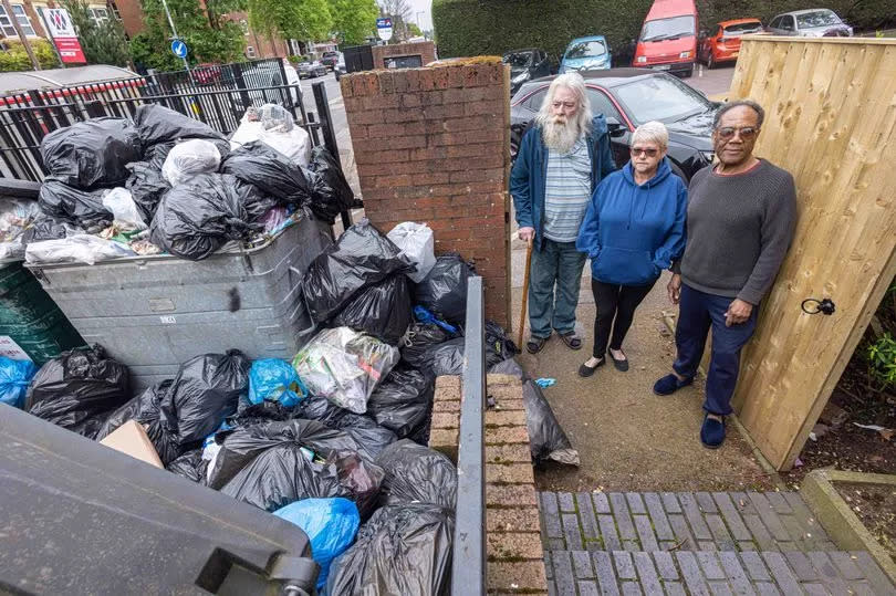 Residents John White, Milton Godfrey, Annette Campbell are upset at the mounting rubbish