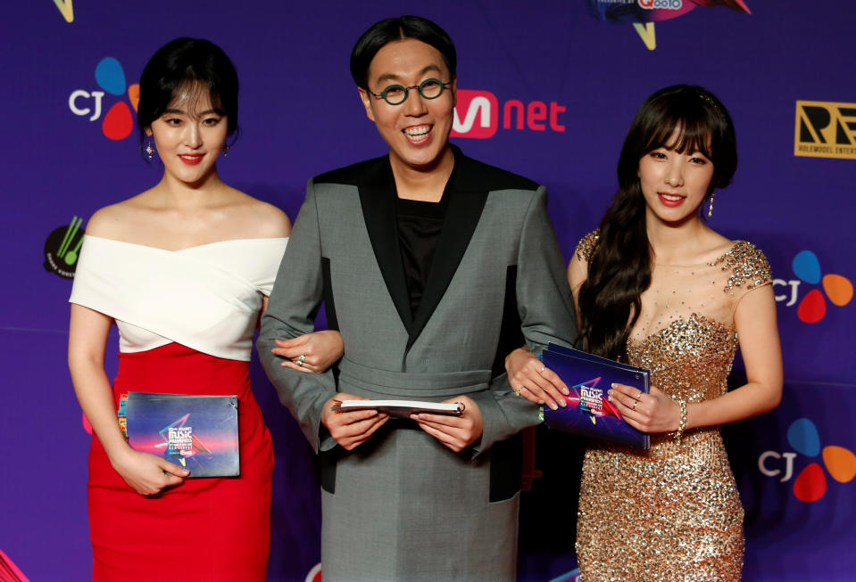 South Korean artists Shin A-young, Kim Young-chcul and Jisook pose during the Mnet Asian Music Awards in Hong Kong