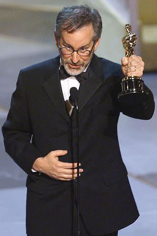 <p>TIMOTHY A. CLARY/AFP via Getty </p> Steven Spielberg at the 71st Academy Awards in 1999