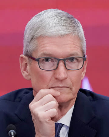 Apple CEO Tim Cook attends the annual session of China Development Forum (CDF) 2018 at the Diaoyutai State Guesthouse in Beijing, China March 26, 2018. REUTERS/Jason Lee