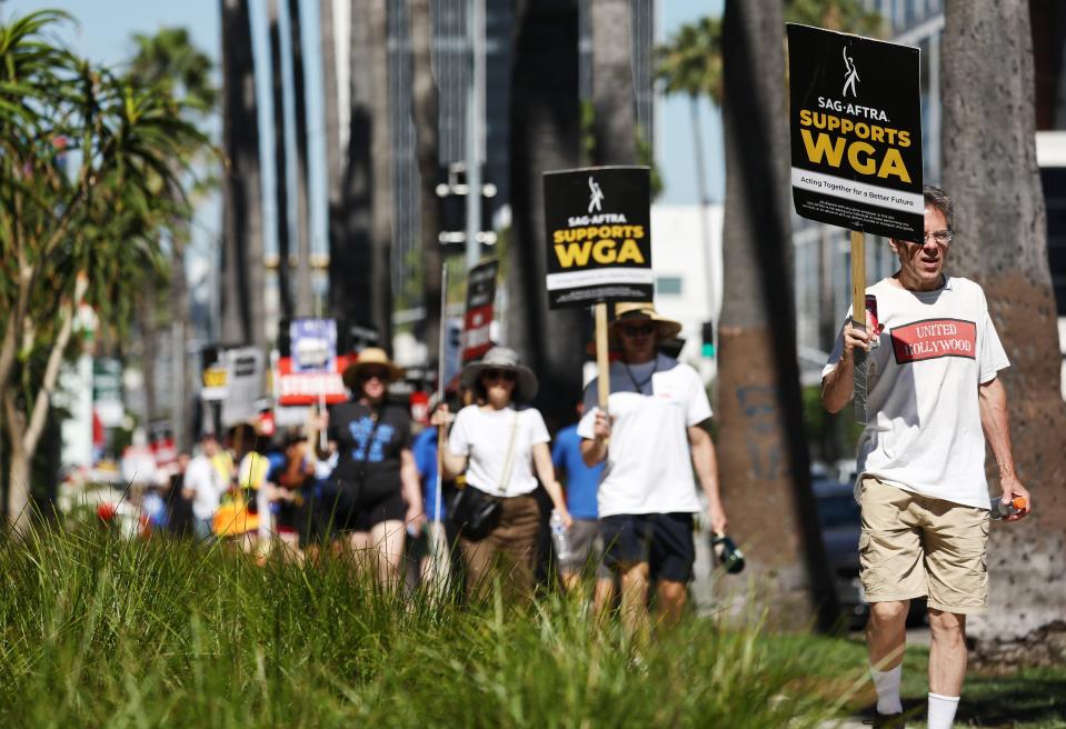 Striking SAG-AFTRA members join WGA members on the picket lines (Getty Images)