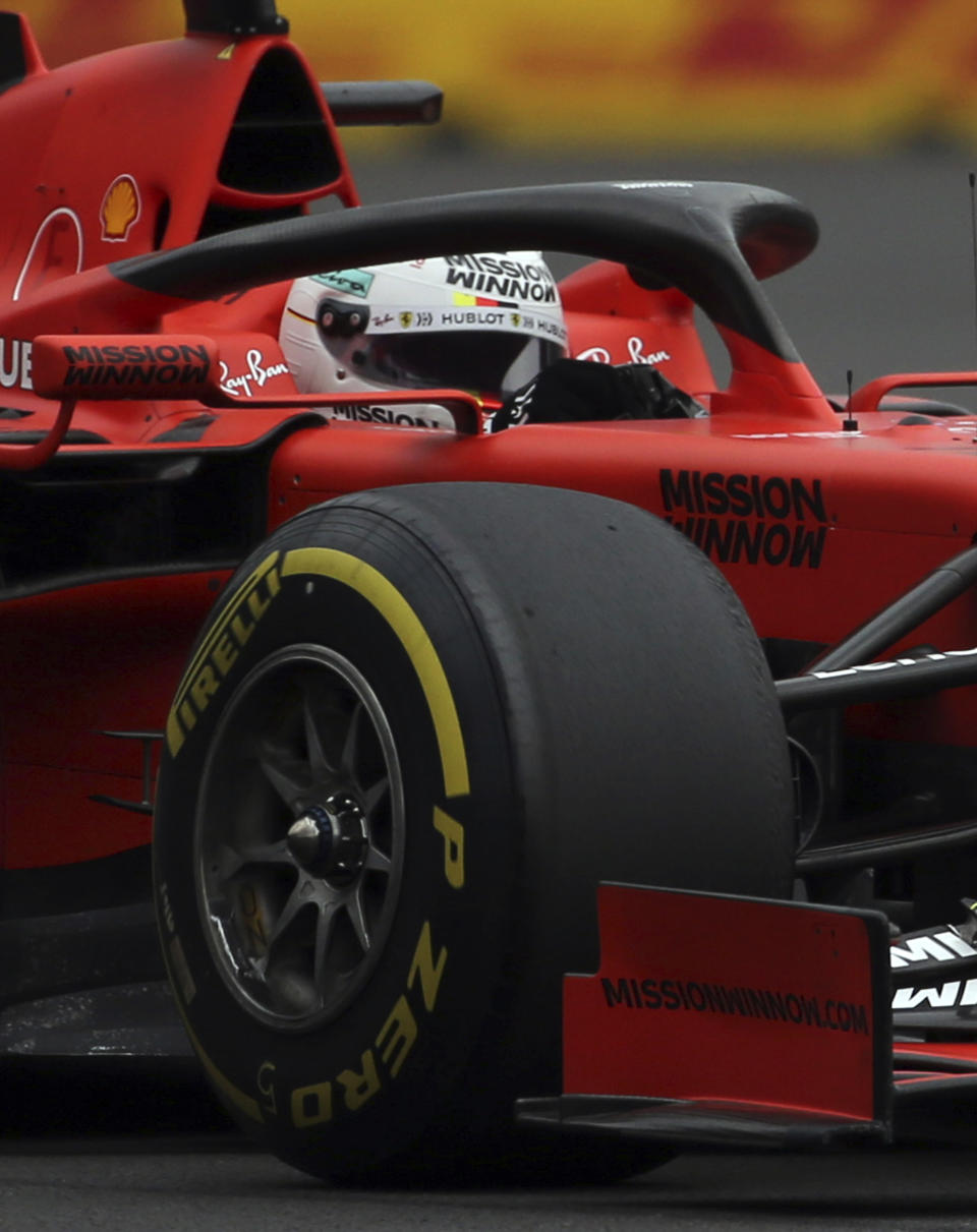 Ferrari driver Sebastian Vettel, of Germany, drives his car during a training session of the Formula One Mexico Grand Prix auto race at the Hermanos Rodriguez racetrack in Mexico City, Friday, Oct. 25, 2019. (AP Photo/Marco Ugarte)