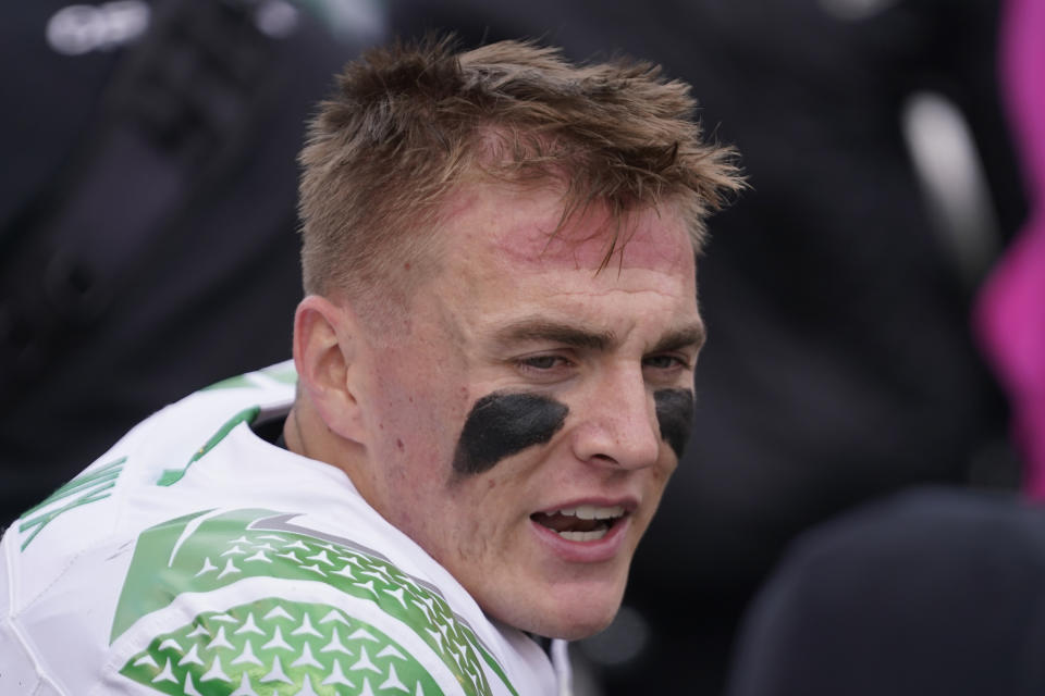 Oregon quarterback Bo Nix (10) looks on during the second half of an NCAA college football game against Utah Saturday, Oct. 28, 2023, in Salt Lake City. (AP Photo/Rick Bowmer)