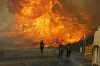 <p>A hillside erupts in flame as a raging wildfire fire burns in Placerita Canyon in Santa Clarita, Calif., July 25, 2016. (AP Photo/Nick Ut)</p>