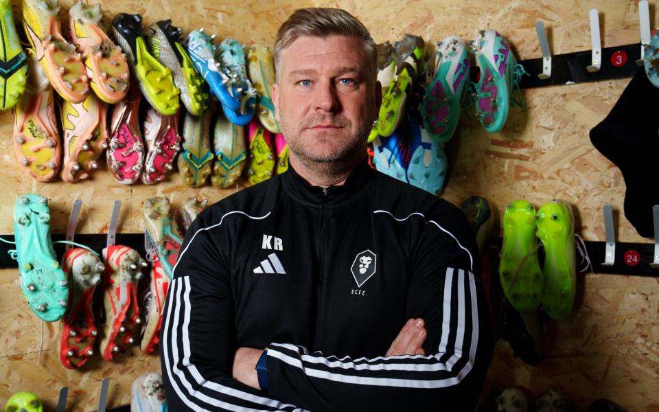 Karl Robinson in the boot room at Salford City