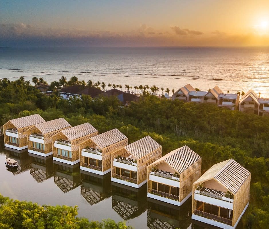 <p>Banyan Tree Mayakoba</p><p>Check into Yucatán, Mexico, paradise in your very own overwater bungalow perched atop a private lagoon and a stone’s throw away from the beach. The seven Banyan Tree Mayakoba’s Lagoon & Sunset Rooftop Pool Villas are one-bedroom villas you’ll hardly want to leave all vacation long. The airy and light-filled two-story layout invites many daily dips in the rooftop terrace’s heated plunge pool—especially at sunset, when the views are epic. There’s also an outdoor shower and whirlpool bathtub. </p><p>The accommodations are newcomers to this chic Mayakoba resort as of 2022, and the destination also underwent a larger $120 million renovation investment concluding in 2023. Mayakoba comprises nearly 600 acres, a tropical eden of lagoons and sand beaches designed by architects, biologists, geologists, and engineers to preserve the ecosystem of endemic species. Six miles of freshwater lagoons connect four hotels here: Andaz Mayakoba, Banyan Tree Mayakoba, Fairmont Mayakoba, and Rosewood Mayakoba.</p><p>[from $2,269 per night; <a href="https://mayakoba.com/hotels/banyan-tree-mayakoba/" rel="nofollow noopener" target="_blank" data-ylk="slk:mayakoba.com;elm:context_link;itc:0;sec:content-canvas" class="link ">mayakoba.com</a>]</p>