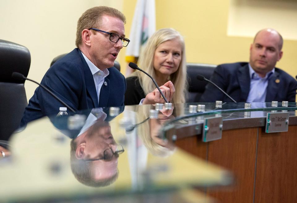 Wellington Mayor Anne Gerwig (center) opposes a term limit measure on the Aug. 23 ballot, saying it is directed at her and intended to keep her from running for village council in 2024, when her present term ends. Council members John McGovern (left) and Michael Drahos (right) say it isn't meant personally, but is meant to encourage people new to Wellington politics to run for office.