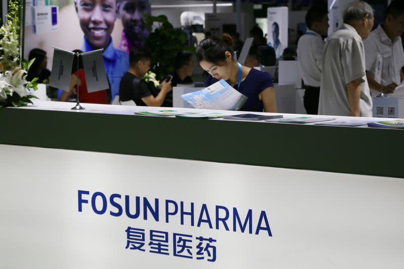 FILE PHOTO: Booth of Fosun Pharma is seen at a medical instruments and equipment expo in Beijing