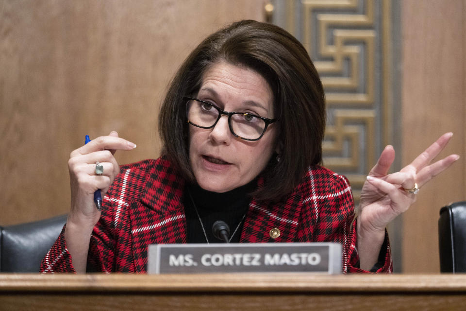 FILE - Sen. Catherine Cortez Masto, D-Nev., asks questions during a hearing, Thursday, March 16, 2023, on Capitol Hill in Washington. National conservation groups, tribes and others in Nevada are up in arms over a pro-mining bill Cortez Masto introduced this week. It would insulate mining companies from a U.S. appeals court ruling that blocked a copper mine in Arizona and is now part of a legal battle over a big lithium mine near the Nevada-Oregon line. Allies on most other conservation issues, environmentalists are accusing Cortez Masto of becoming a puppet for the mining industry. (AP Photo/Jacquelyn Martin, File)