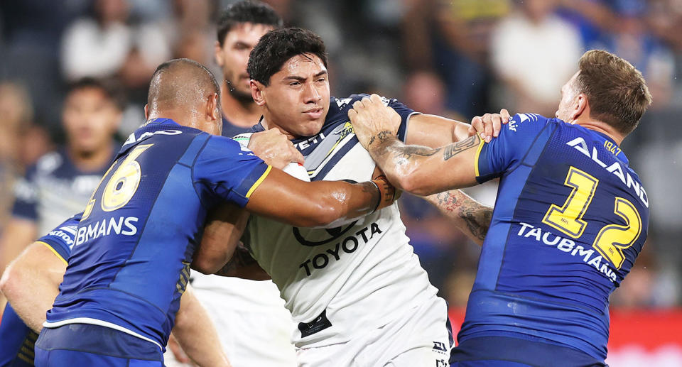 Seen here, Jason Taumalolo is tackled against Parramatta in the NRL.