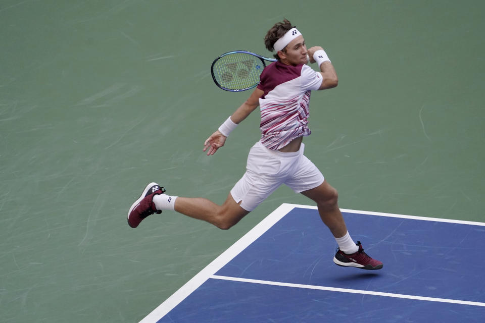 Casper Ruud, of Norway, follows through on a return to Karen Khachanov, of Russia, during the semifinals of the U.S. Open tennis championships, Friday, Sept. 9, 2022, in New York. (AP Photo/Mary Altaffer)