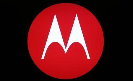 A Motorola Mobility logo is seen on a screen at the public unveiling of their global headquarters in Chicago, Illinois, April 22, 2014. REUTERS/Jim Young