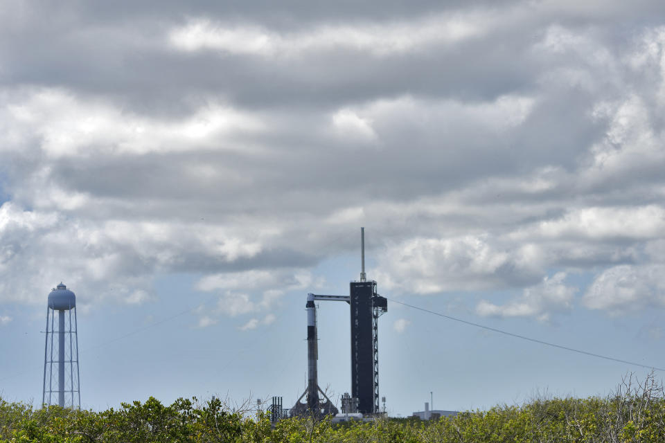 A SpaceX Falcon rocket sits on Launch Complex 39A Tuesday, April 26, 2022, at the Kennedy Space Center in Cape Canaveral, Fla. Four astronauts are scheduled fly on SpaceX's mission to the International Space Station. (AP Photo/Chris O'Meara)