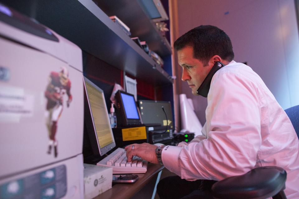 BRISTOL, CT - AUGUST 18: Adam Adam Schefter, who has been an NFL Insider at ESPN for five years, sits at office desk at ESPN Headquarters in Bristol, Conn., on Monday, August 18, 2014.(Photo by Christopher Capozziello/For The Washington Post via Getty Images)