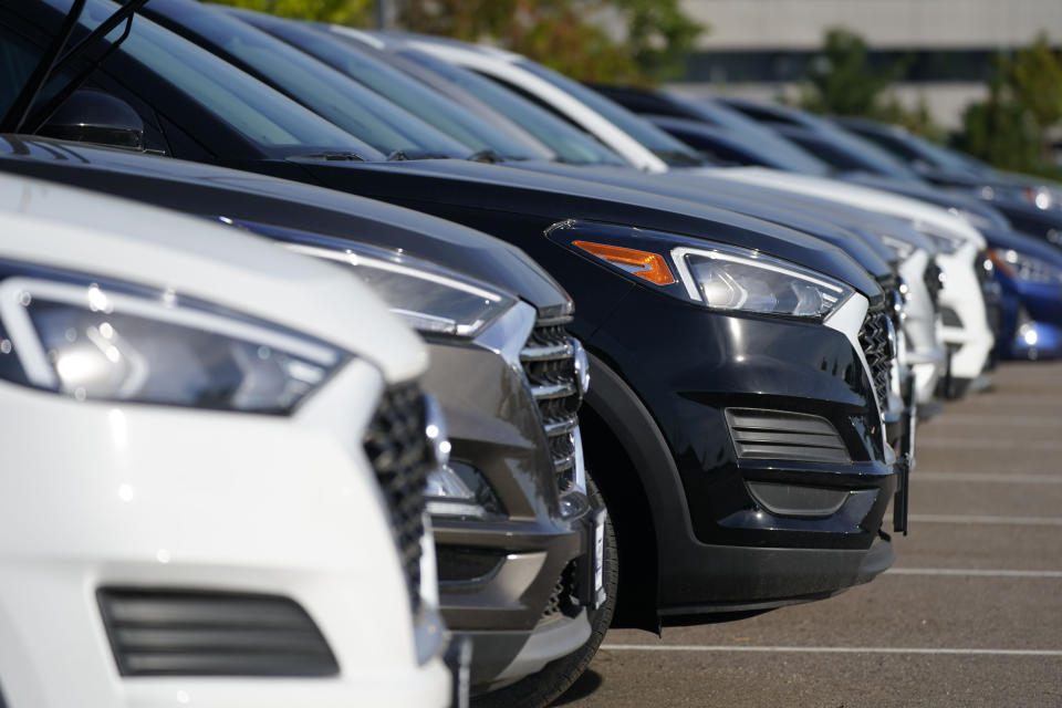 A long line of unsold 2020 Hyundai models sits in a storage lot Thursday, Sept. 3, 2020, in Centennial, Colo. (AP Photo/David Zalubowski)