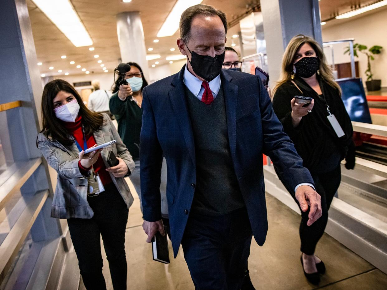 <p>Senator Pat Toomey (R-PA) walks through the Senate subway at the conclusion of former President Donald Trump's second impeachment trial February 13, 2021 in Washington, DC</p> (Getty Imges)