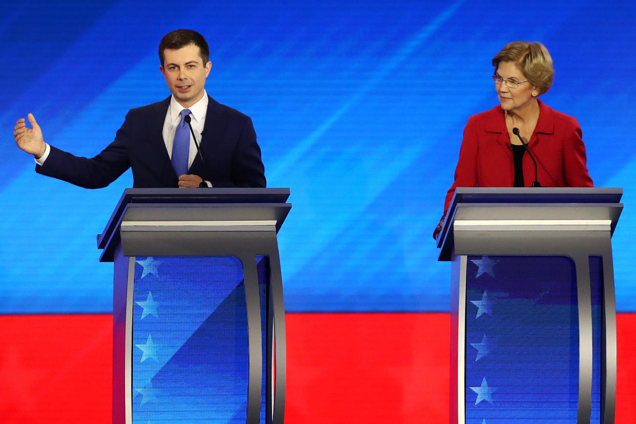 Former South Bend, Indiana, Mayor Pete Buttigieg and Sen. Elizabeth Warren (D-Mass.) participate in the Democratic presidential primary debate in the Sullivan Arena at St. Anselm College on Feb. 7 in Manchester, New Hampshire. (Photo: Joe Raedle via Getty Images)