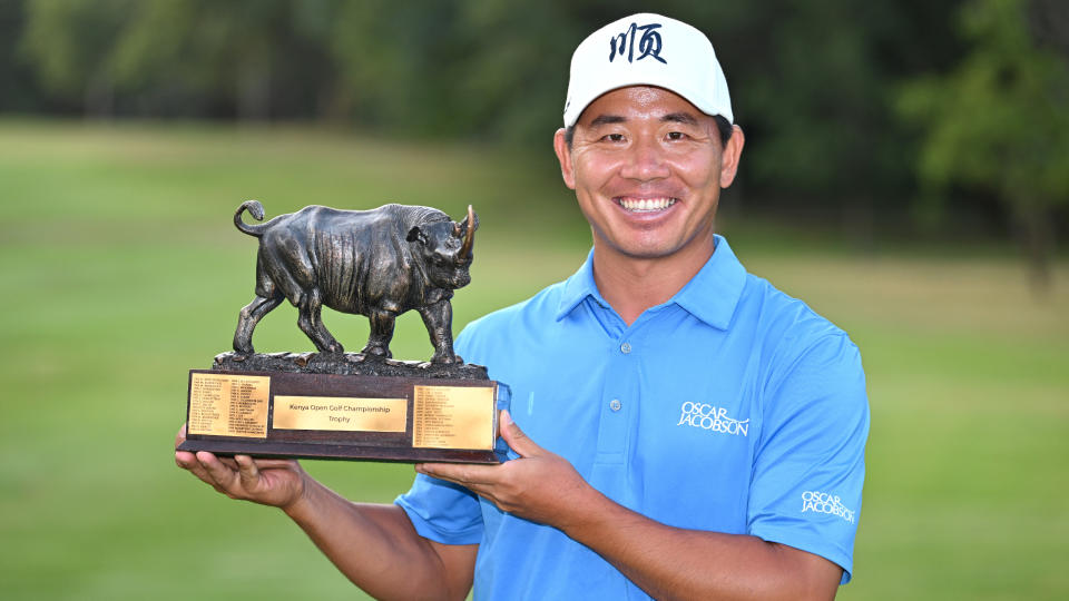   Ashun Wu with the trophy after winning the 2022 Magical Kenya Open 