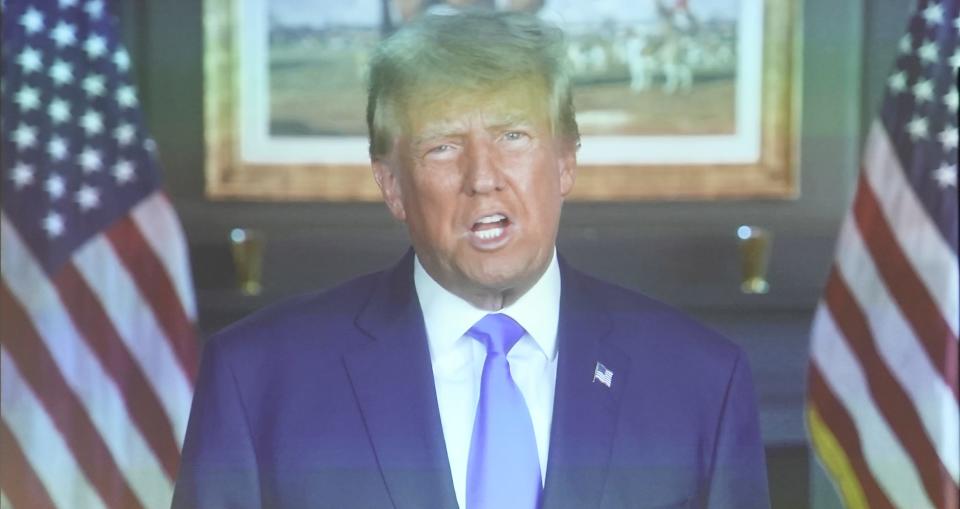 Donald Trump's 2024 election video is played during the 2023 Republican Party of Wisconsin convention Saturday, June 17, 2023, at the La Crosse Center.