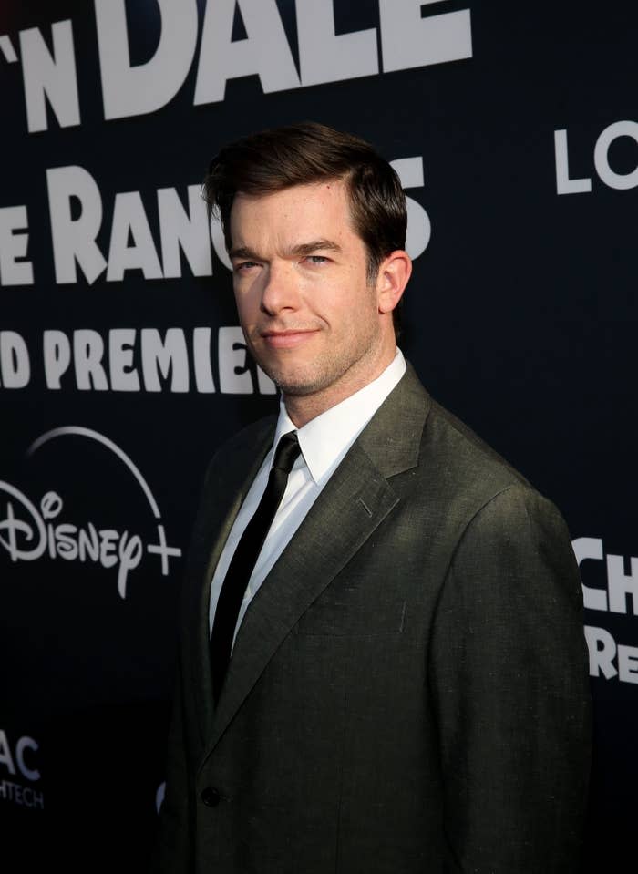 A close-up of John Mulaney at a red carpet event