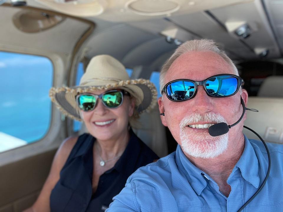 Kenneth Allen and his wife, Stanna, onboard a plane. Allen lost consciousness on May 10 on a flight back from The Bahamas, leaving two passengers with no flight experience to land the plane. They safely arrived at Palm Beach International Airport, where Allen was rushed to the hospital and underwent surgery for a tear in his heart's aorta.