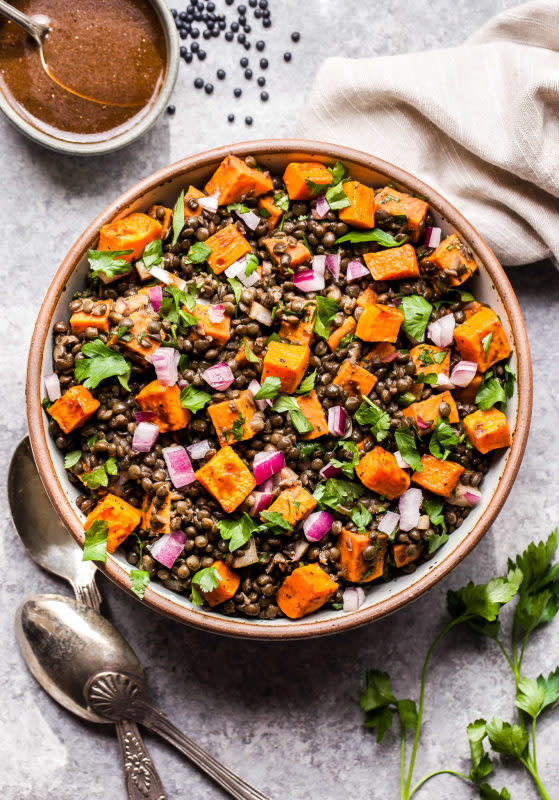 <p>Recipe Runner</p><p>This salad is the perfect balance of earthy and sweet flavors. It is plant-based but hearty enough to serve as a main dish<strong>.</strong></p><p><strong>Get the recipe: <a href="https://reciperunner.com/roasted-sweet-potato-lentil-salad/" rel="nofollow noopener" target="_blank" data-ylk="slk:Roasted Sweet Potato Lentil Salad;elm:context_link;itc:0;sec:content-canvas" class="link ">Roasted Sweet Potato Lentil Salad</a></strong></p>