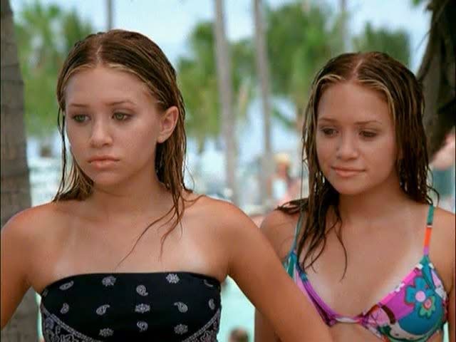 Mary-Kate and Ashley Olsen on the beach in "Holiday in the Sun."