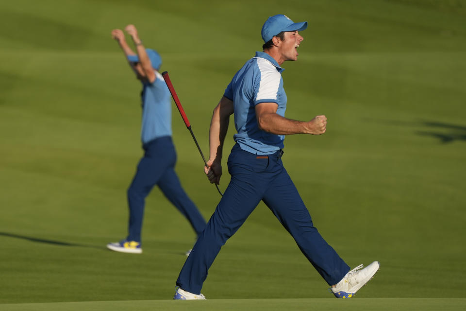 Europe's Viktor Hovland reacts and celebrates after his birdie putt earned Europe a tie in his afternoon Fourballs match at the Ryder Cup golf tournament at the Marco Simone Golf Club in Guidonia Montecelio, Italy, Friday, Sept. 29, 2023. (AP Photo/Gregorio Borgia )