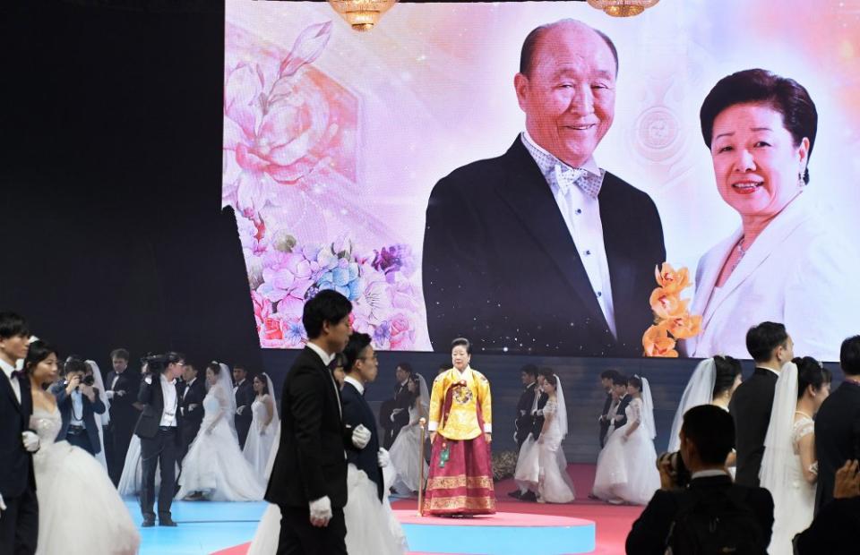 Hak-ja Han, wife of late Unification Church founder Rev. Sun Myung Moon, stands among newly married couples during a Blessing Ceremony of the Family Federation for World Peace and Unification at the Cheong Shim Peace World Center in Gapyeong, South Korea, on Feb. 7, 2020.<span class="copyright">Keizo Mori—UPI/Shutterstock</span>