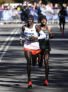 Athletics - New York City Marathon - New York City, New York, U.S. - November 4, 2018 Kenya's Geoffrey Kamworor and Ethiopia's Lelisa Desisa in action during the Professional Men's race REUTERS/Darren Ornitz