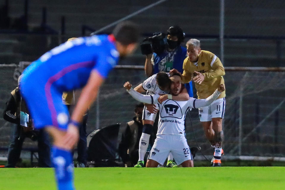 MEXICO CITY, MEXICO - DECEMBER 06: Juan Vigon #22 of Pumas celebrates his team's fourth goal during the semifinal second leg match between Pumas UNAM and Cruz Azul as part of the Torneo Guard1anes 2020 Liga MX at Olimpico Universitario Stadium on December 06, 2020 in Mexico City, Mexico. (Photo by Manuel Velasquez/Getty Images)