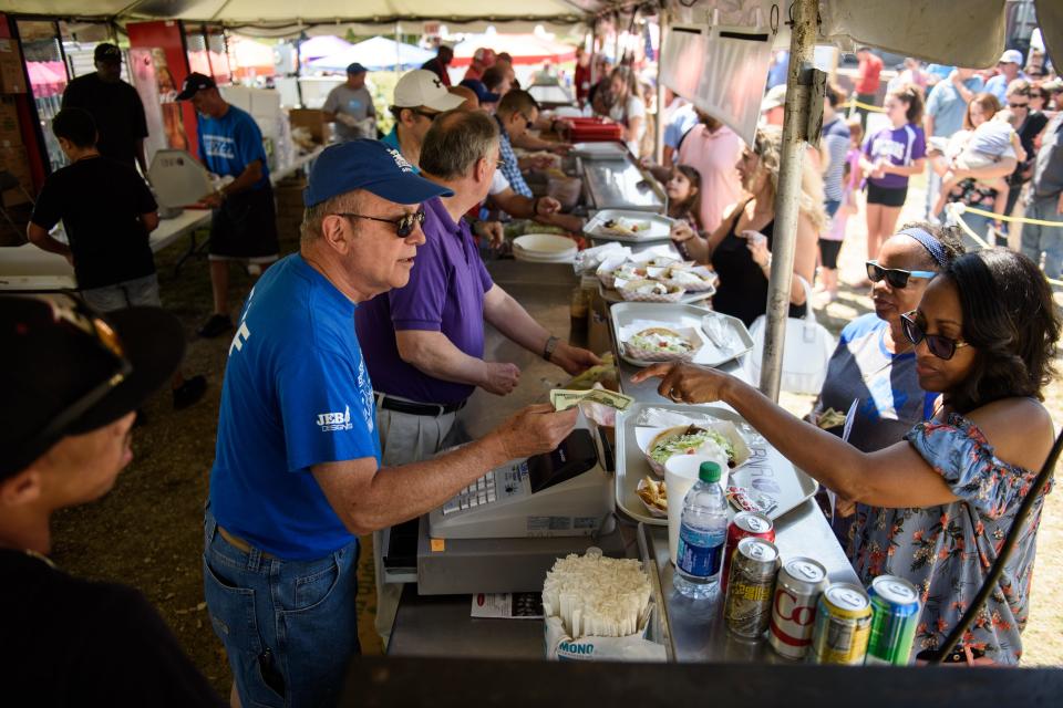 Festival goers buy food at the Greek Festival in 2017. [Andrew Craft/The Fayetteville Observer]