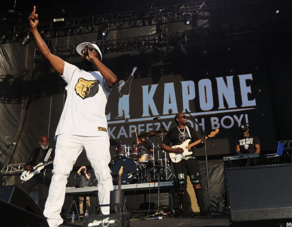 Al Kapone and his band perform during the Beale Street Music Fest's opening night at Liberty Bowl Park on Friday, April 29, 2022. 